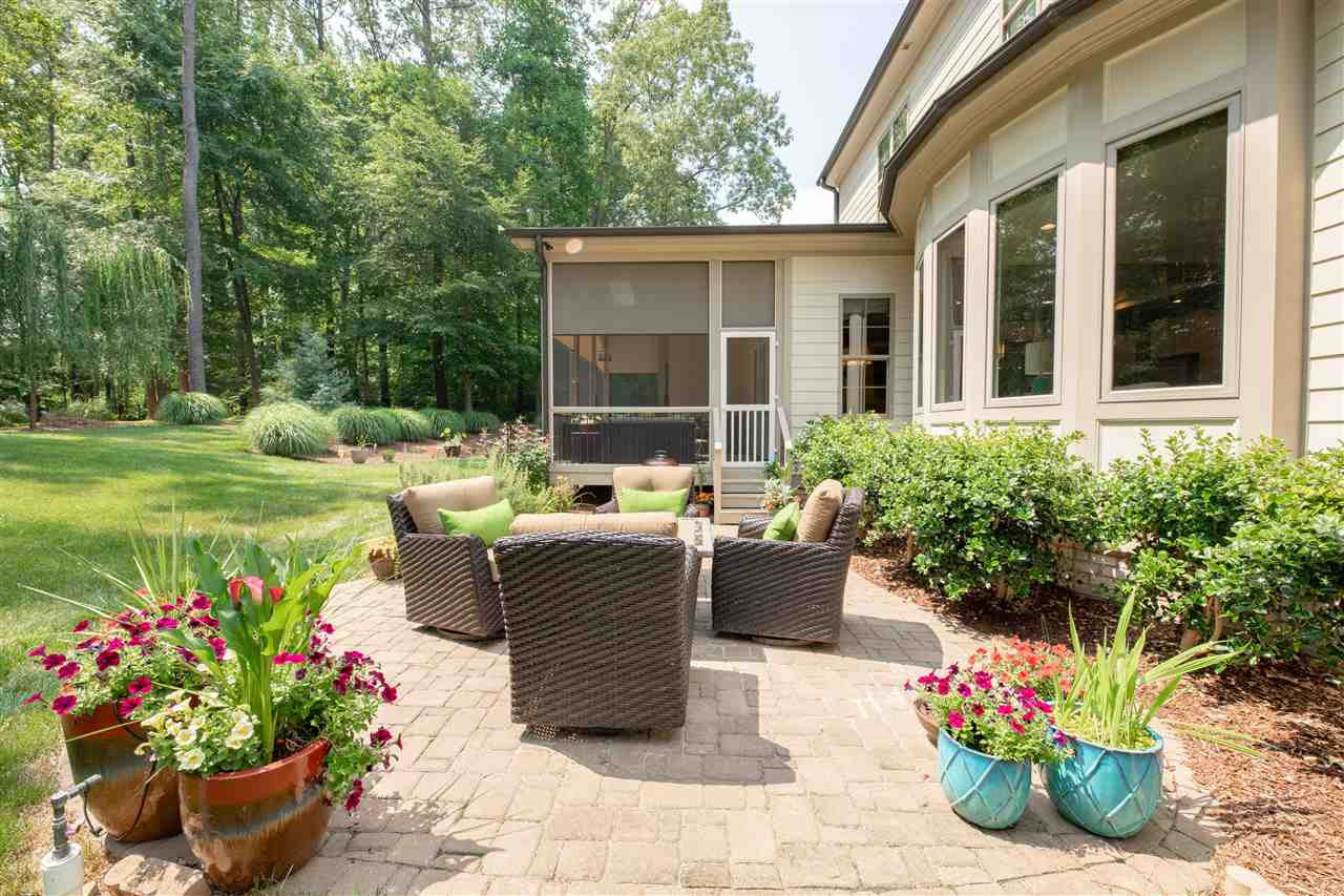 1437 Tacketts Pond Drive Raleigh, NC 27614 - Photo 20 of 30 The private patio off the back is perfect for entertaining your guests or relaxing and enjoying the outdoors. patio