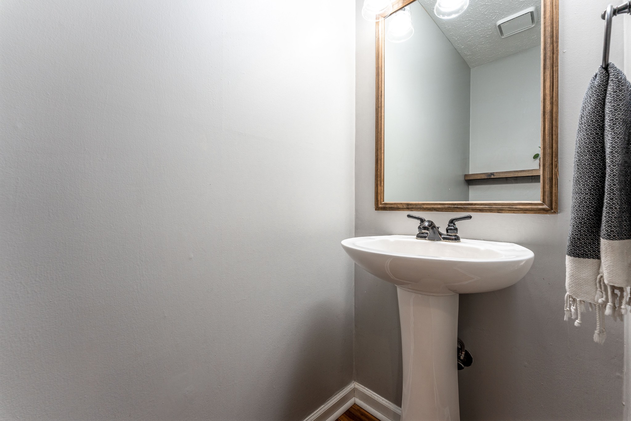 809 Ridgetop Drive Mount Juliet, TN 37122 - Photo 20 of 32 a bathroom with a sink and mirror