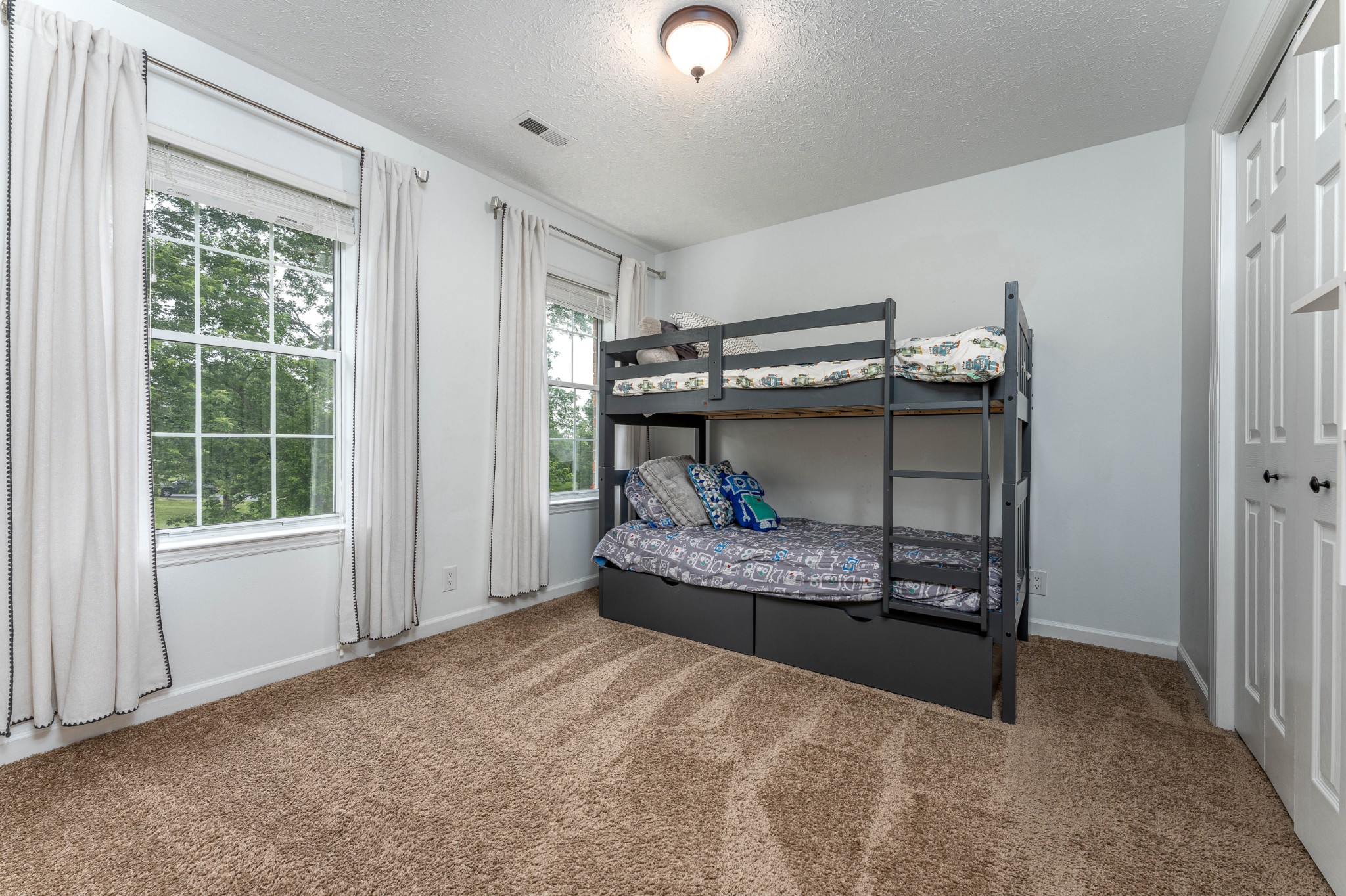 809 Ridgetop Drive Mount Juliet, TN 37122 - Photo 21 of 32 a view of a room with furniture and a window