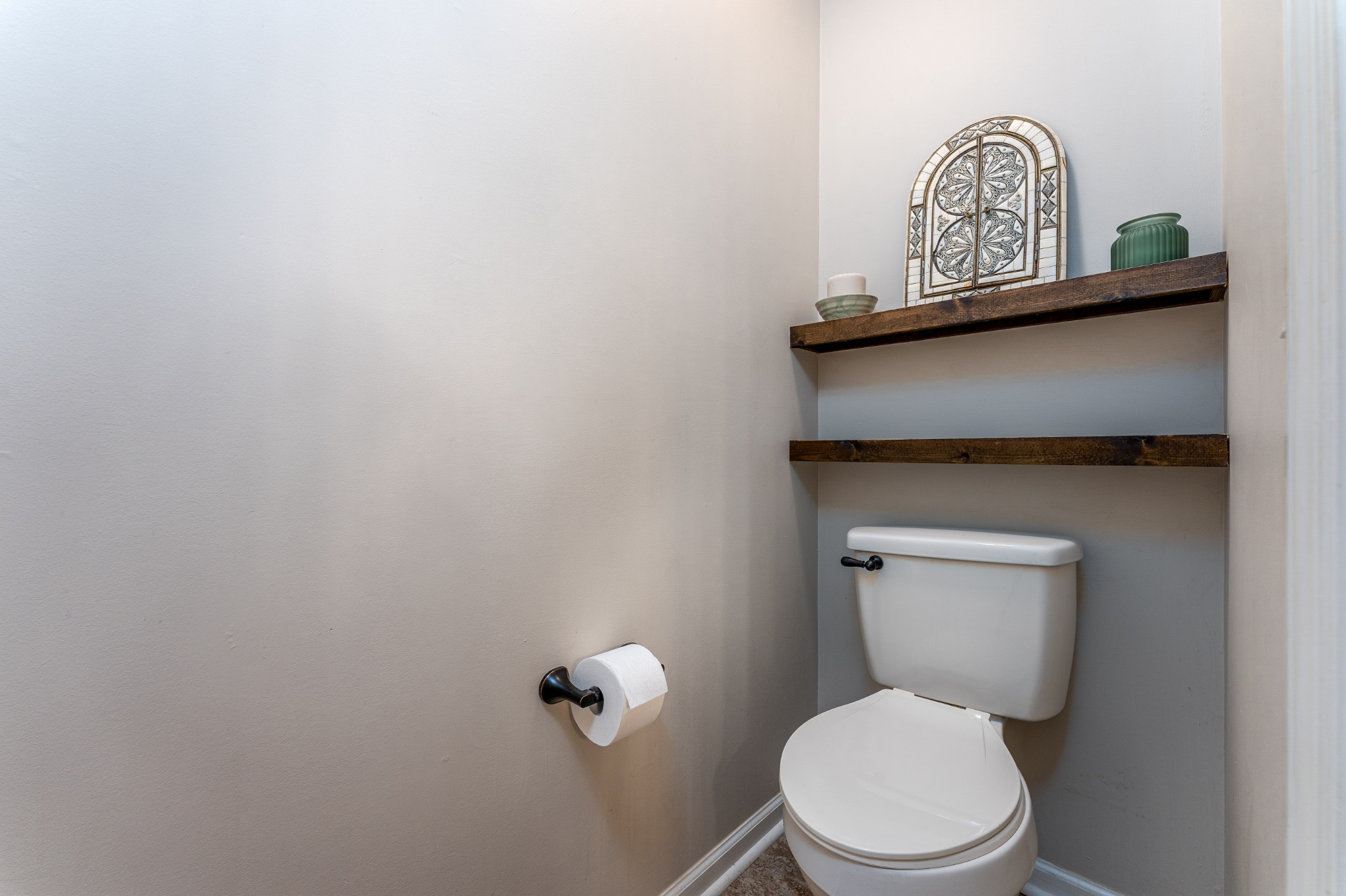 809 Ridgetop Drive Mount Juliet, TN 37122 - Photo 22 of 32 a white toilet sitting next to a shower