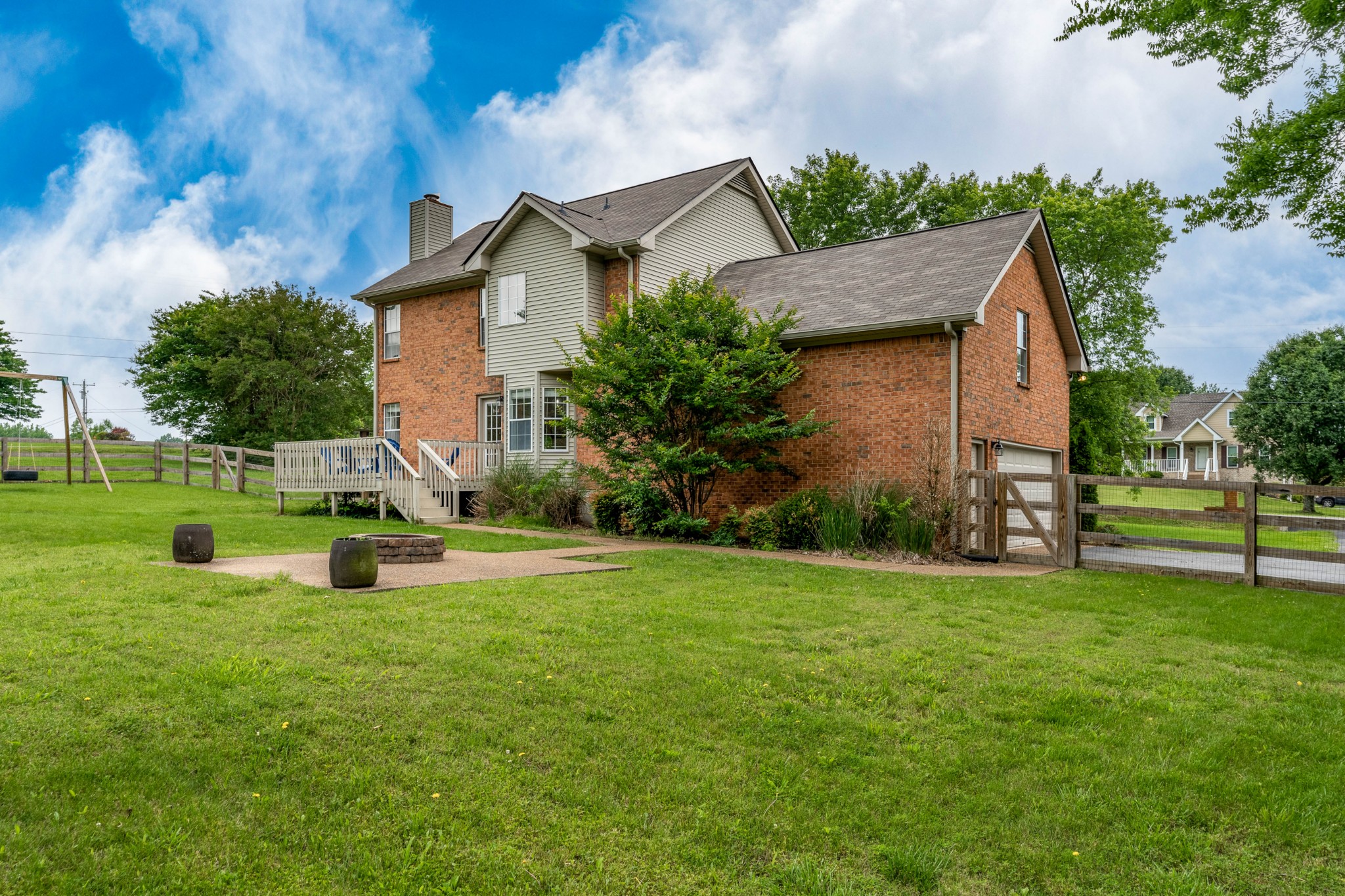 809 Ridgetop Drive Mount Juliet, TN 37122 - Photo 27 of 32 a view of a house with a yard and sitting area