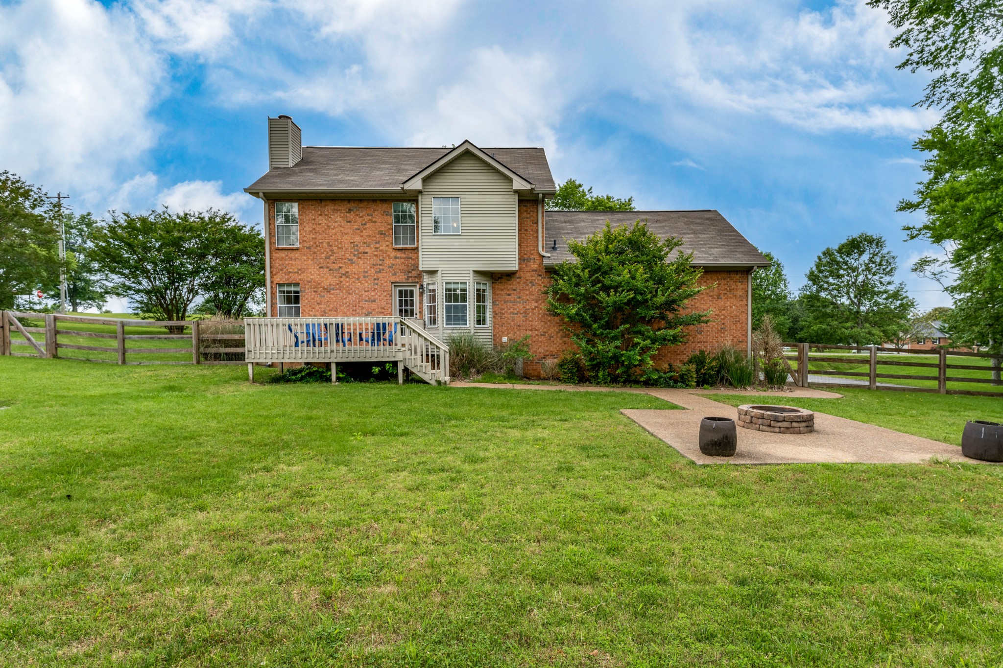809 Ridgetop Drive Mount Juliet, TN 37122 - Photo 28 of 32 a view of a house with a yard and sitting area