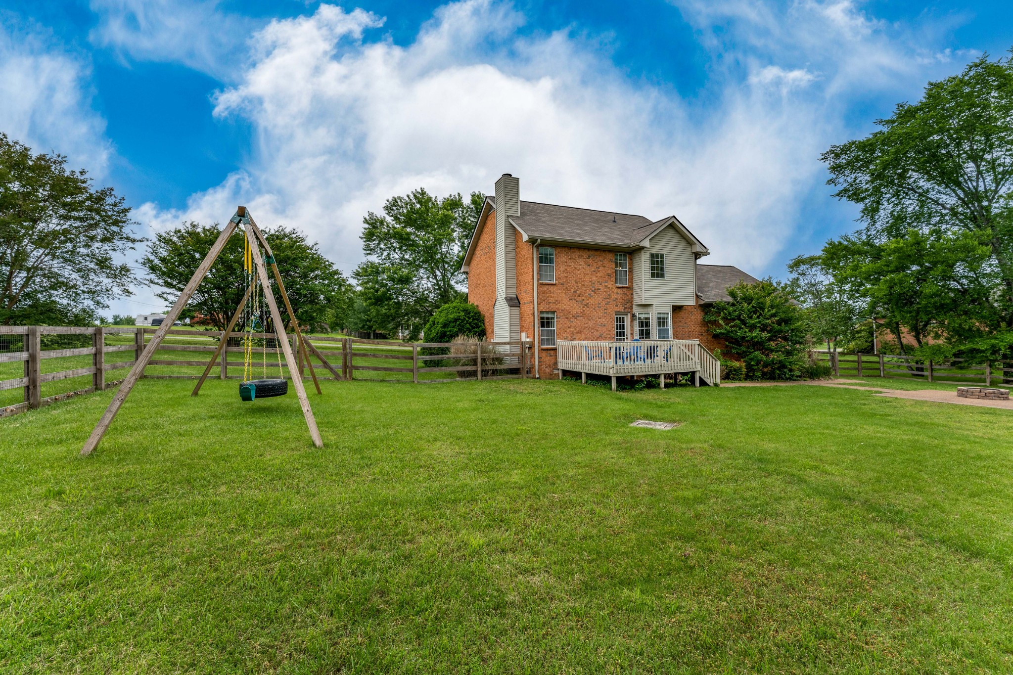 809 Ridgetop Drive Mount Juliet, TN 37122 - Photo 29 of 32 a view of a house with a backyard