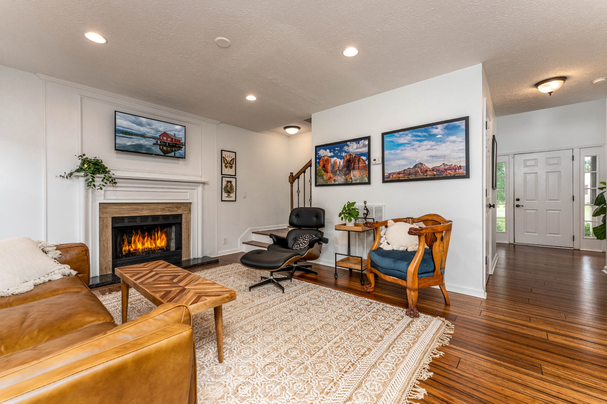 809 Ridgetop Drive Mount Juliet, TN 37122 - Photo 10 of 32 a living room with furniture and a fireplace