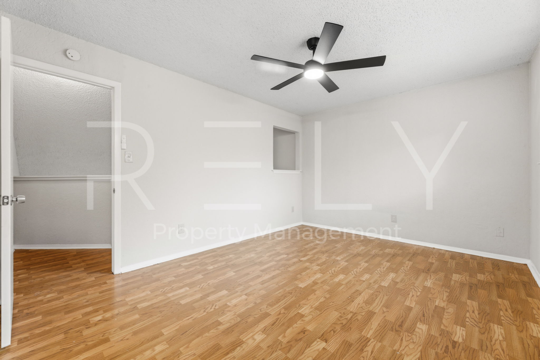 1005 Milford Way, Unit A Austin, TX 78745 - Photo 21 of 30 wooden floor in an empty room