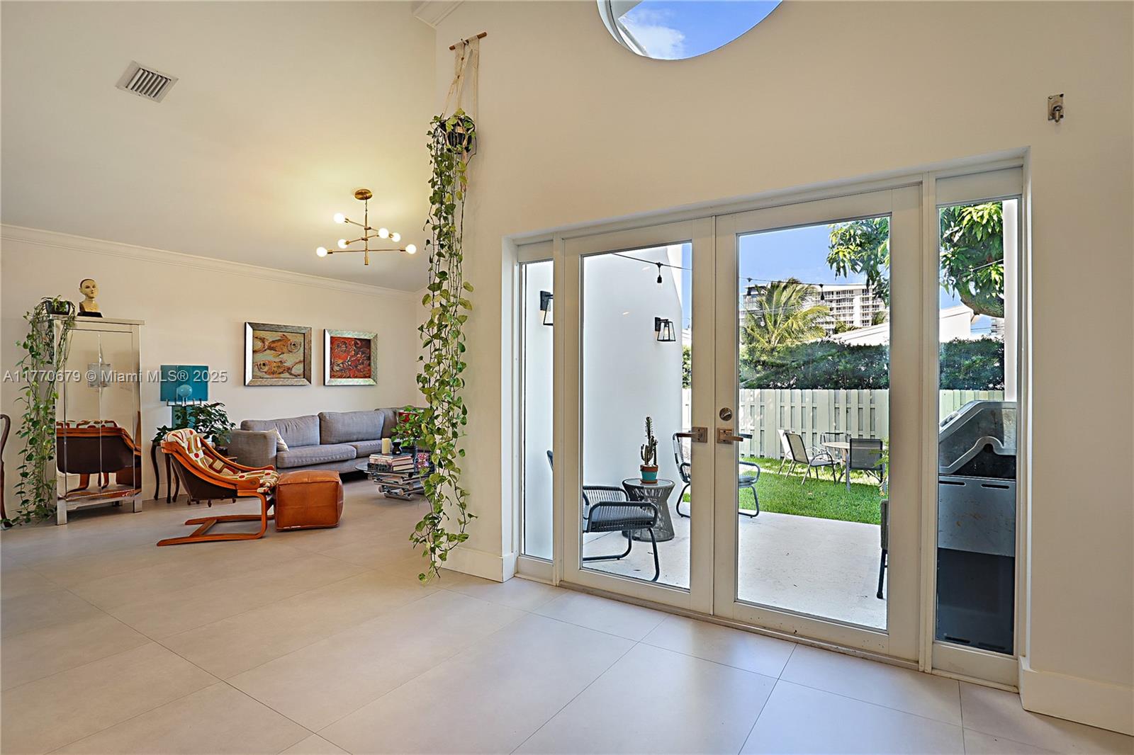 8919 Byron Avenue Surfside, FL 33154 - Photo 25 of 51 a view of a livingroom with furniture and toys