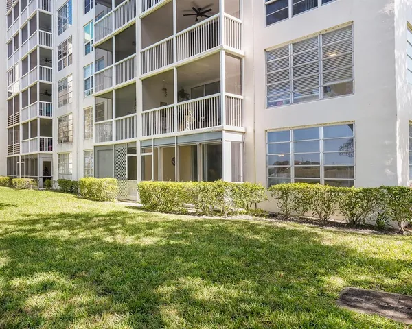 a building view with a garden space