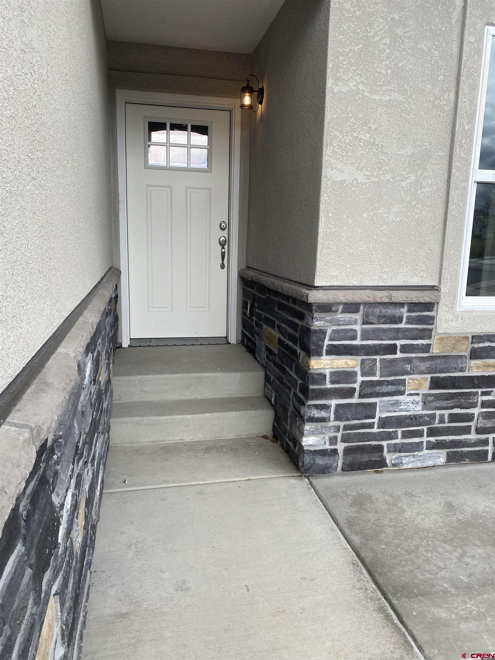 3674 Big Pines Loop Montrose, CO 81401 - Photo 2 of 19 a view of entryway