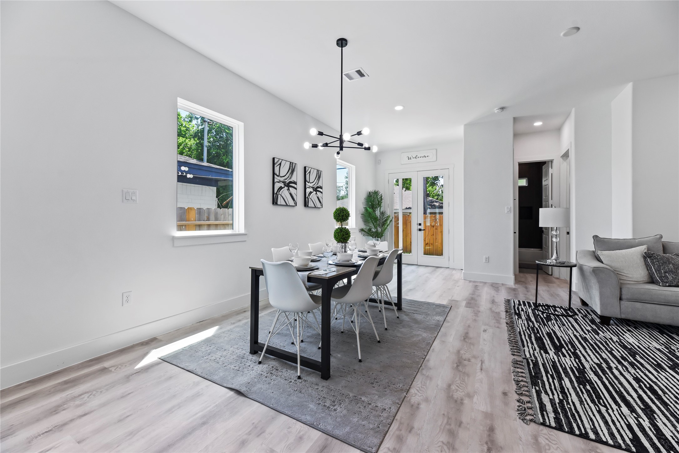 7210 England Street Houston, TX 77021 - Photo 15 of 37 a view of a dining room with furniture window and wooden floor