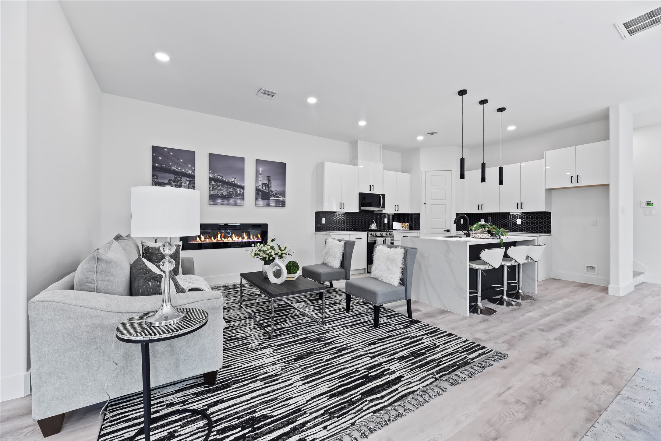 7210 England Street Houston, TX 77021 - Photo 17 of 37 a living room with furniture and kitchen view