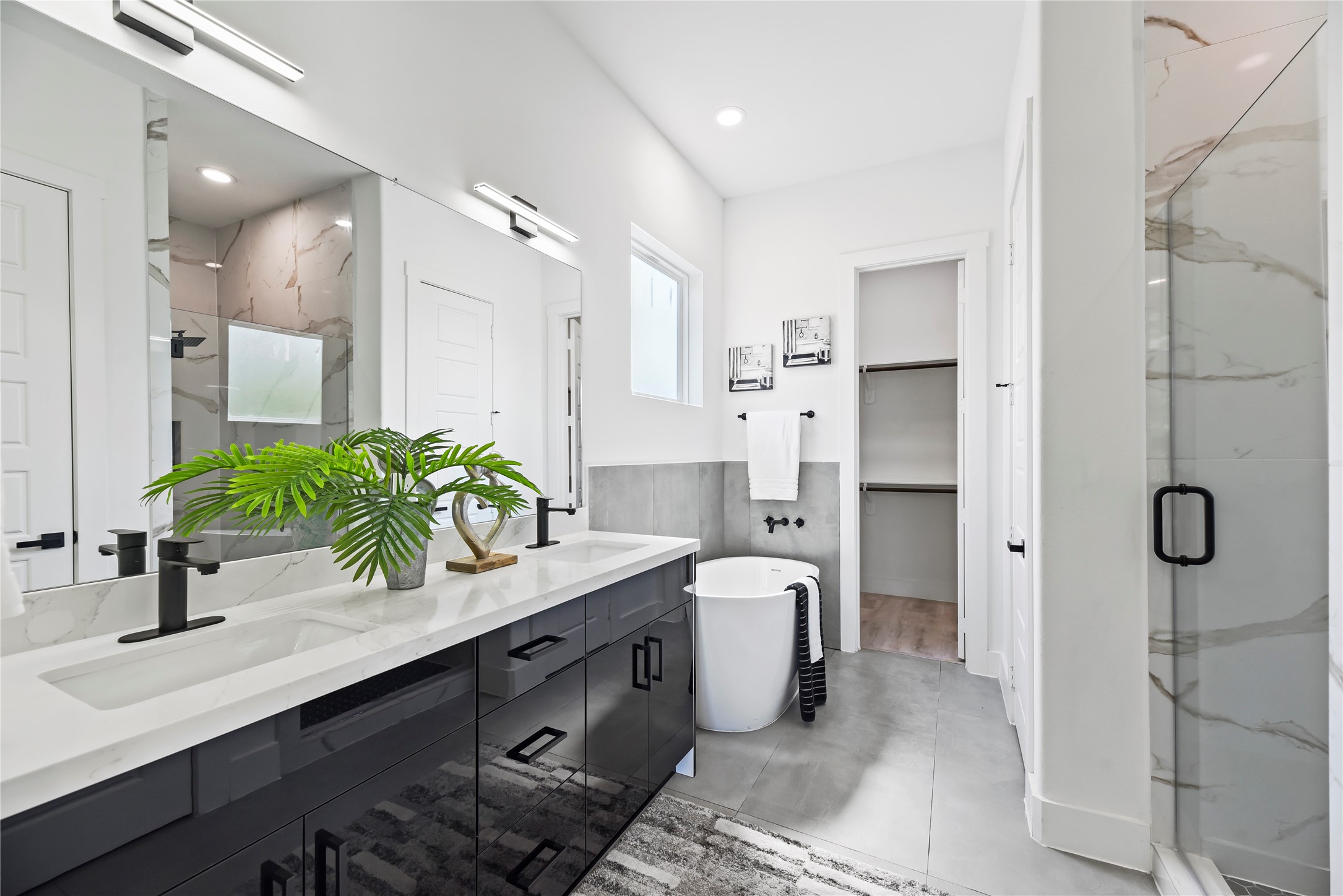 7210 England Street Houston, TX 77021 - Photo 33 of 37 a bathroom with a double vanity sink mirror and shower