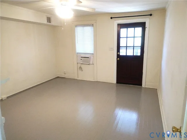 an empty room with windows