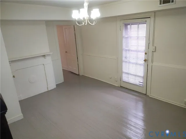 wooden floor and windows in an empty room