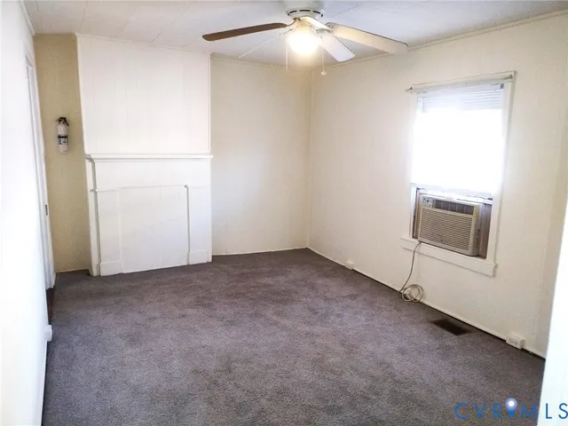 an empty room with a bathroom