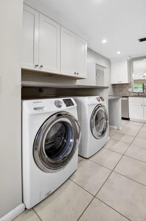 a aerial view of multiple houses with a yard