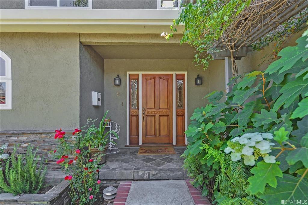 a front view of a house with a porch