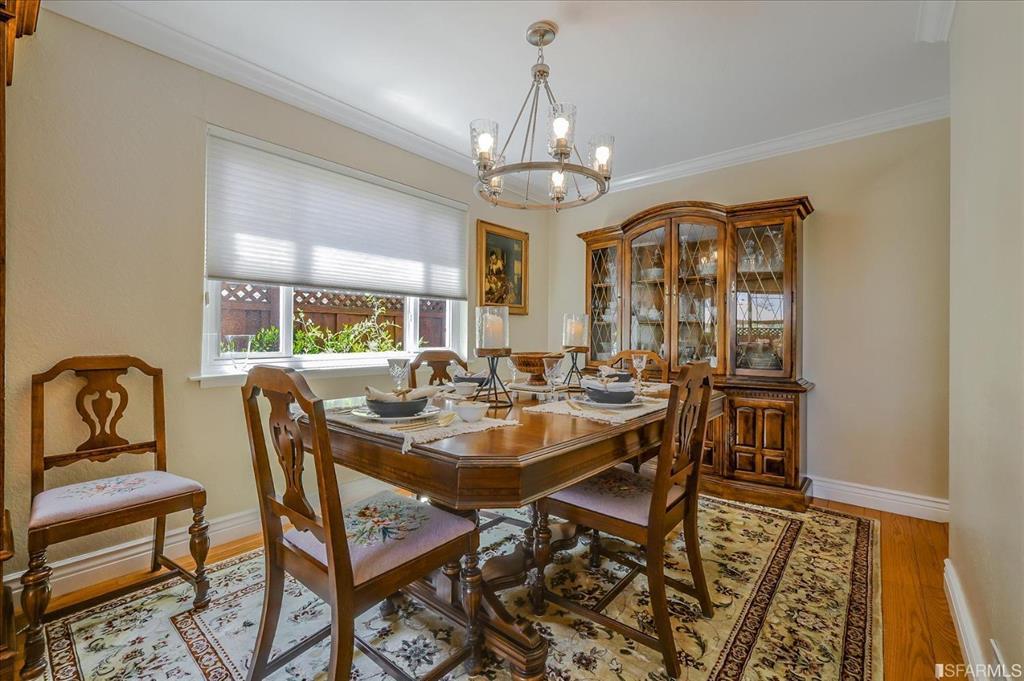5 Maple Way San Carlos, CA 94070 - Photo 5 of 5 a dining room with furniture a chandelier and window