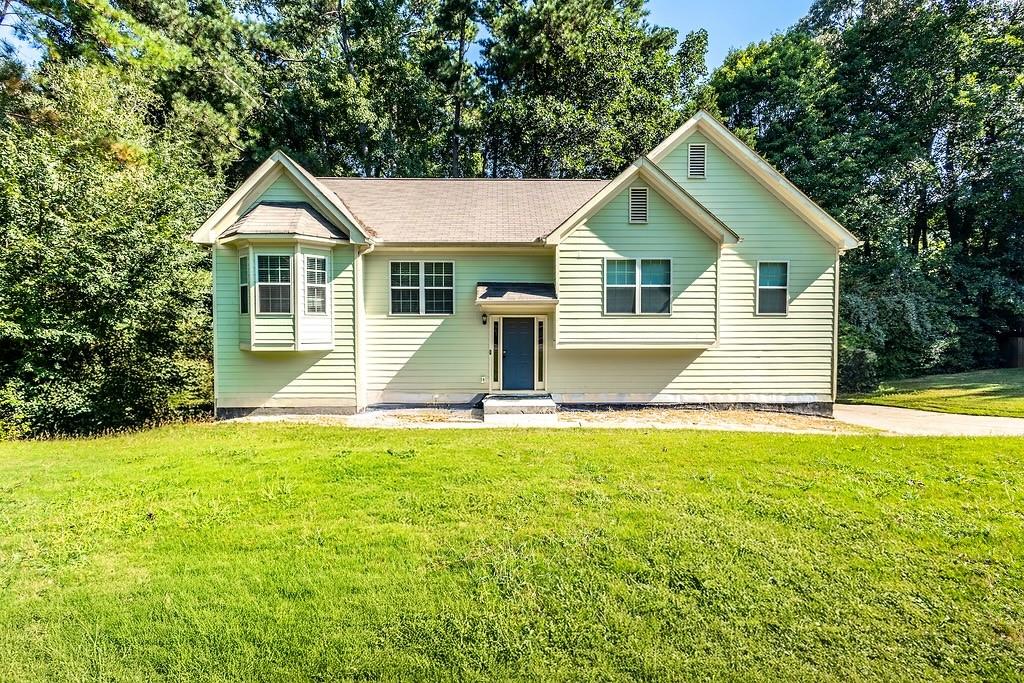 3907 Robin Court Acworth, GA 30101 - Photo 1 of 29 a front view of a house with yard