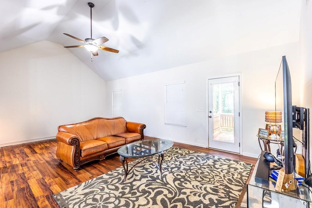 3907 Robin Court Acworth, GA 30101 - Photo 11 of 29 a bedroom with furniture and a rug