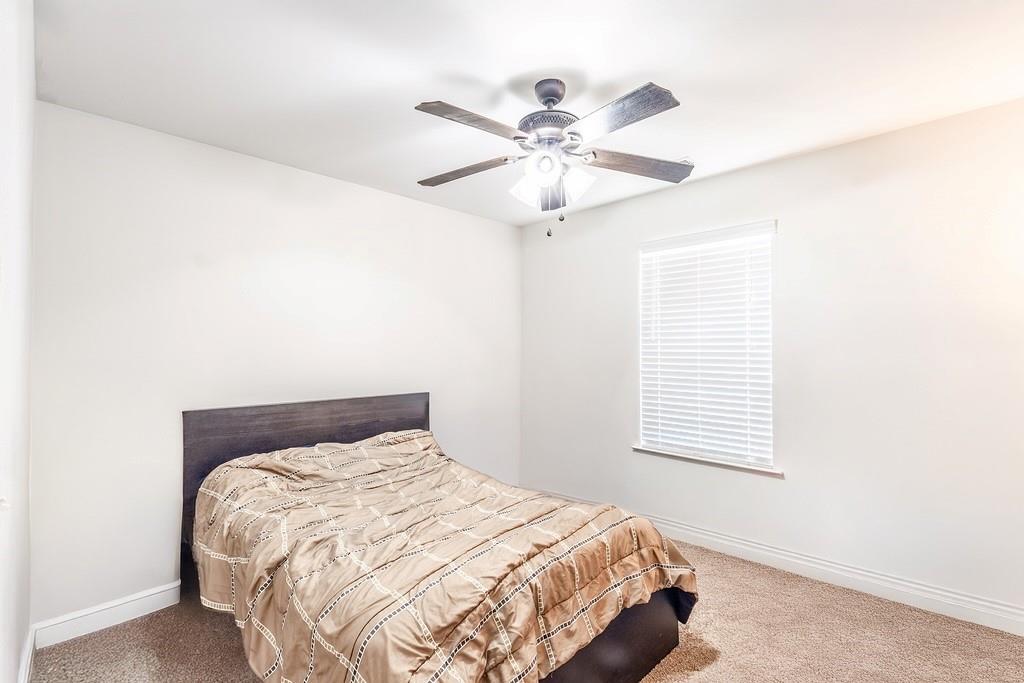 3907 Robin Court Acworth, GA 30101 - Photo 17 of 29 a bedroom with a bed and a window