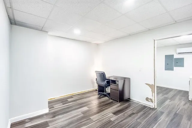 a view of workspace with wooden floor