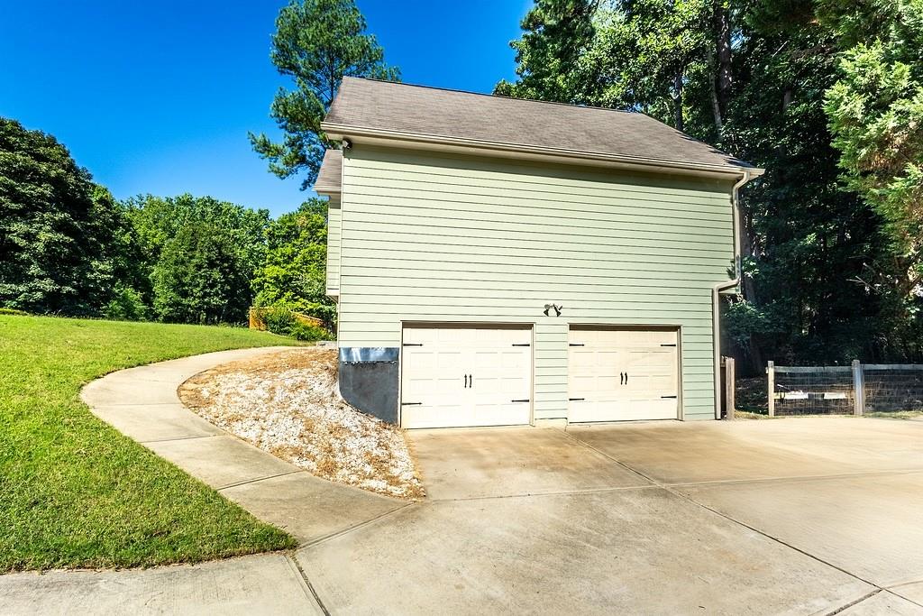 3907 Robin Court Acworth, GA 30101 - Photo 28 of 29 a view of a house with a yard