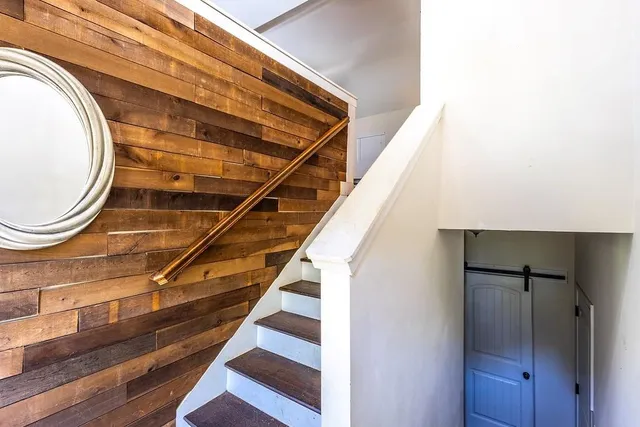 a view of entryway with wooden floor