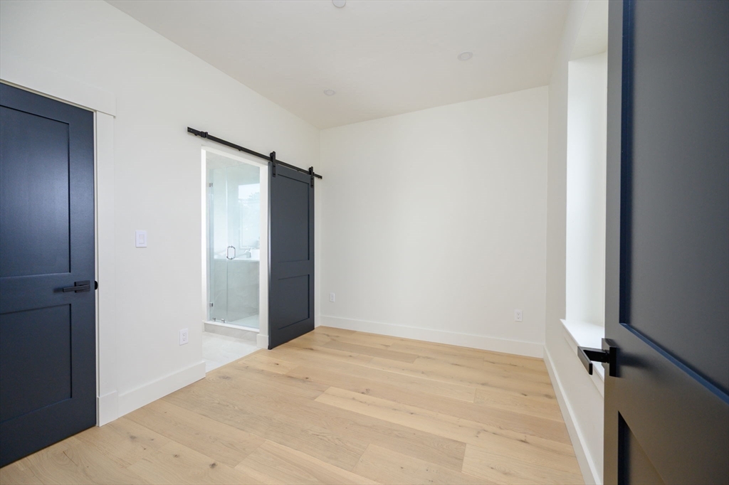 21 Tanglewood Road, Unit 3 Boston, MA 02126 - Photo 16 of 22 a view of an empty room