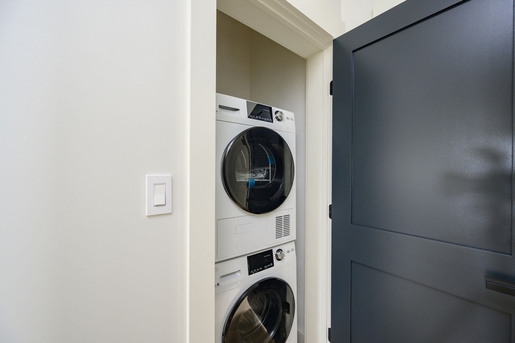 21 Tanglewood Road, Unit 3 Boston, MA 02126 - Photo 19 of 22 a utility room with dryer and washer
