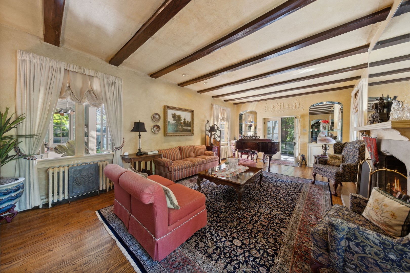 719 South County Line Road Hinsdale, IL 60521 - Photo 8 of 52 a living room with furniture or couch and a window