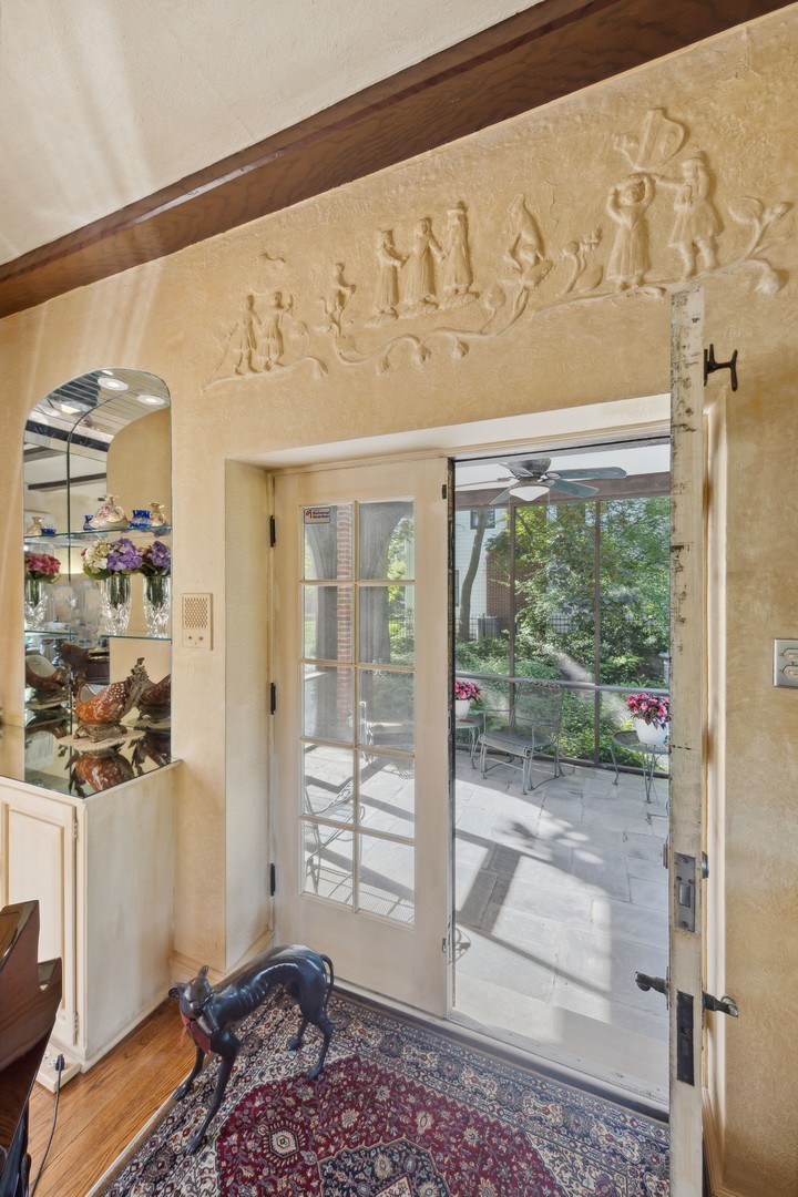 719 South County Line Road Hinsdale, IL 60521 - Photo 10 of 52 a room with furniture and a window