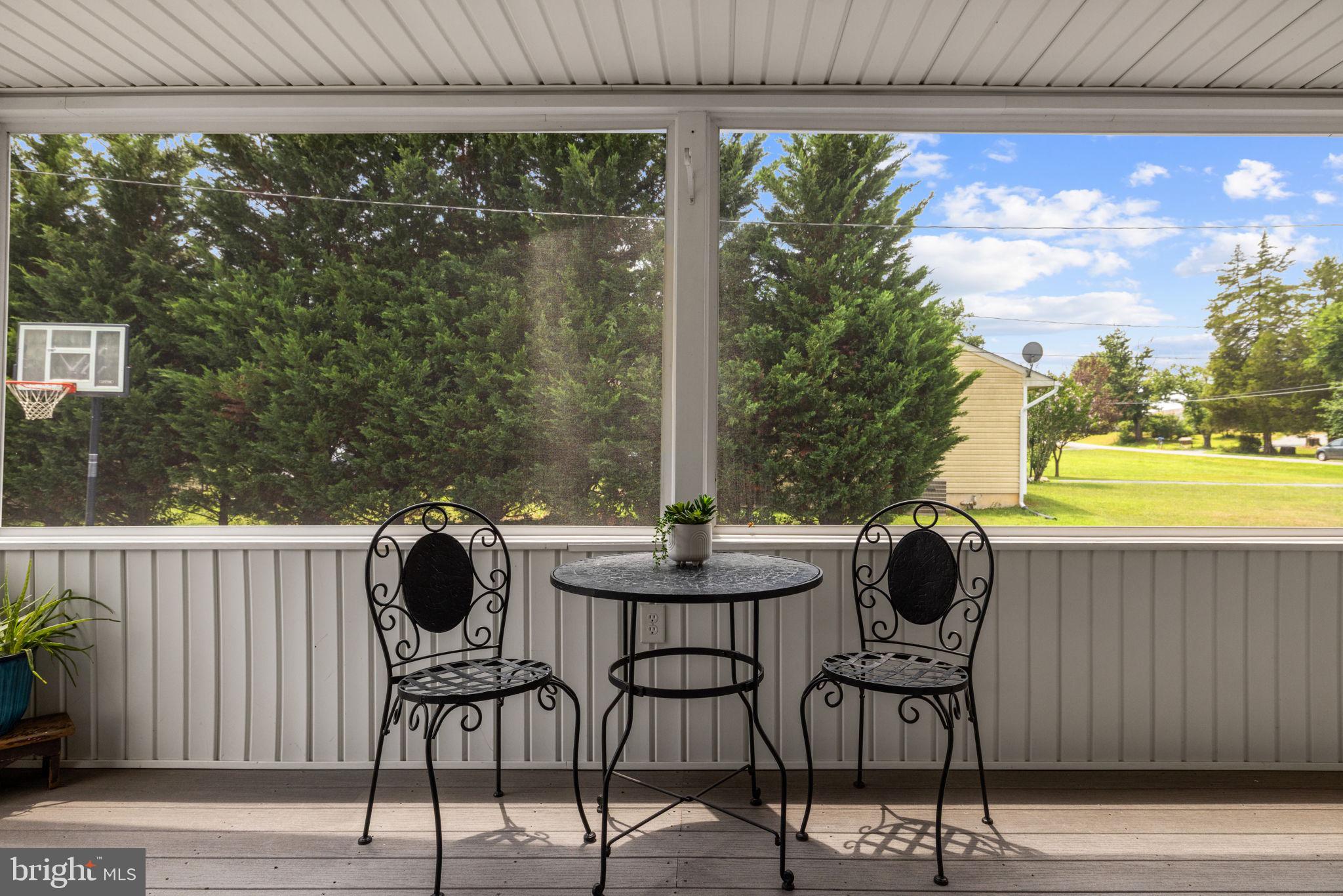 171 Triple J Road Berryville, VA 22611 - Photo 36 of 95 Best little off kitchen screened sitting area.