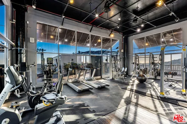 a view of a room with gym equipment