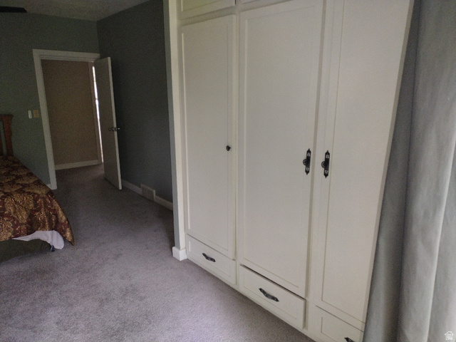157 West 500 South Logan, UT 84321 - Photo 6 of 38 Built-in cabinetry with paneled doors and drawer storage