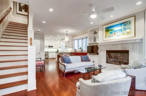a kitchen with a stove a sink and a refrigerator