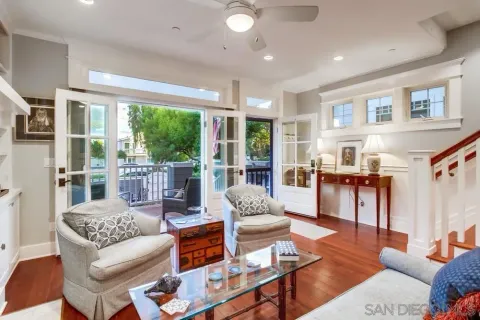 a kitchen with granite countertop a sink stainless steel appliances and cabinets