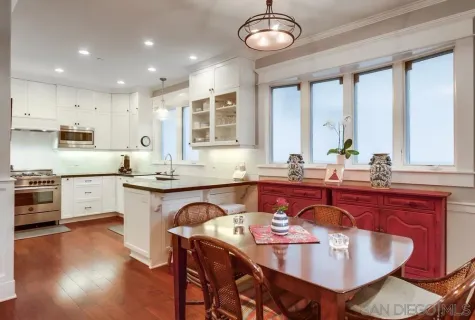 a view of entryway with wooden floor and stairs