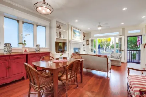 a bedroom with a large bed and a large window
