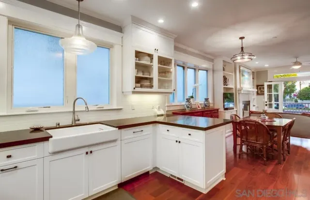 a view of a dresser in front of a mirror