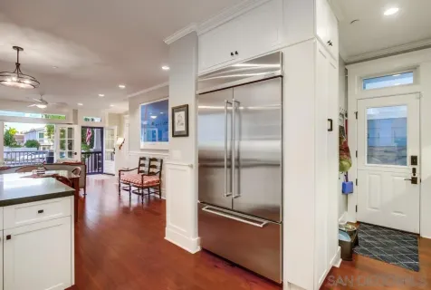 a bathroom with a double vanity sink mirror and