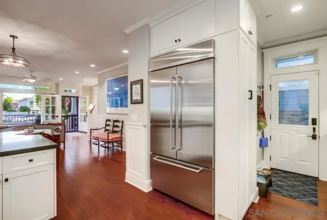 a bathroom with a double vanity sink mirror and