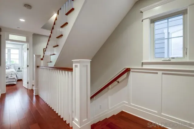 a en suite bathroom with double sink and a mirror