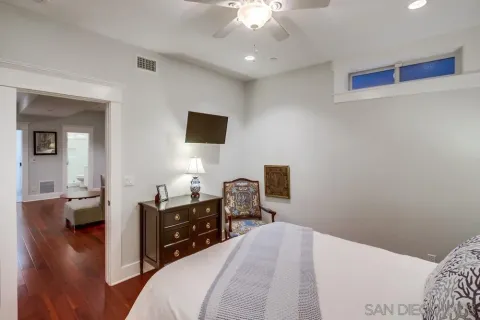 a pathway of a house with a yard