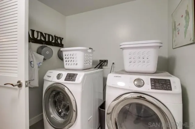 a picture of a bathroom with a white wall
