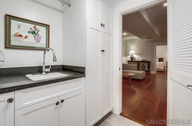 a picture of a bench in a white building