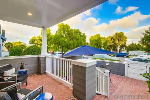 a view of an outdoor sitting area with furniture