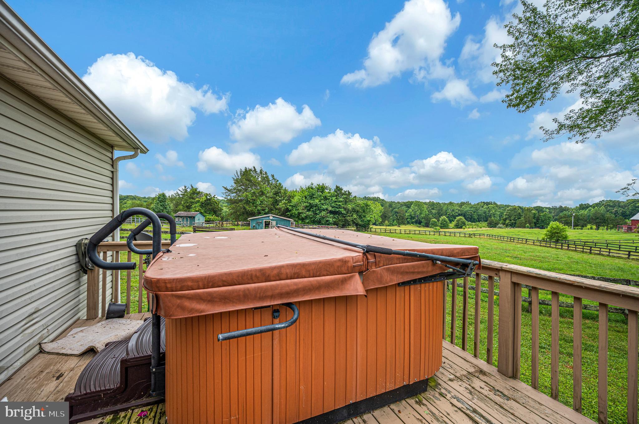 6317 Louisianna Road Locust Grove, VA 22508 - Photo 25 of 57 Hot tub off on deck off of primary bedroom conveys