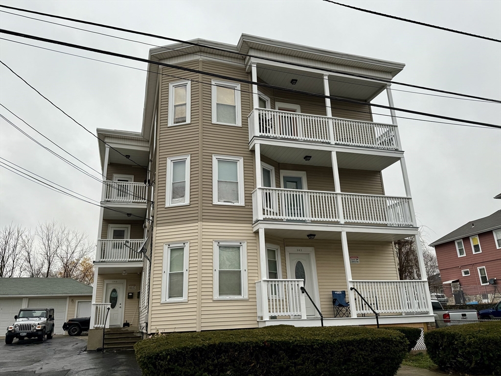 142 Cote Avenue Woonsocket, RI 02895 - Photo 1 of 22 a front view of a house with windows