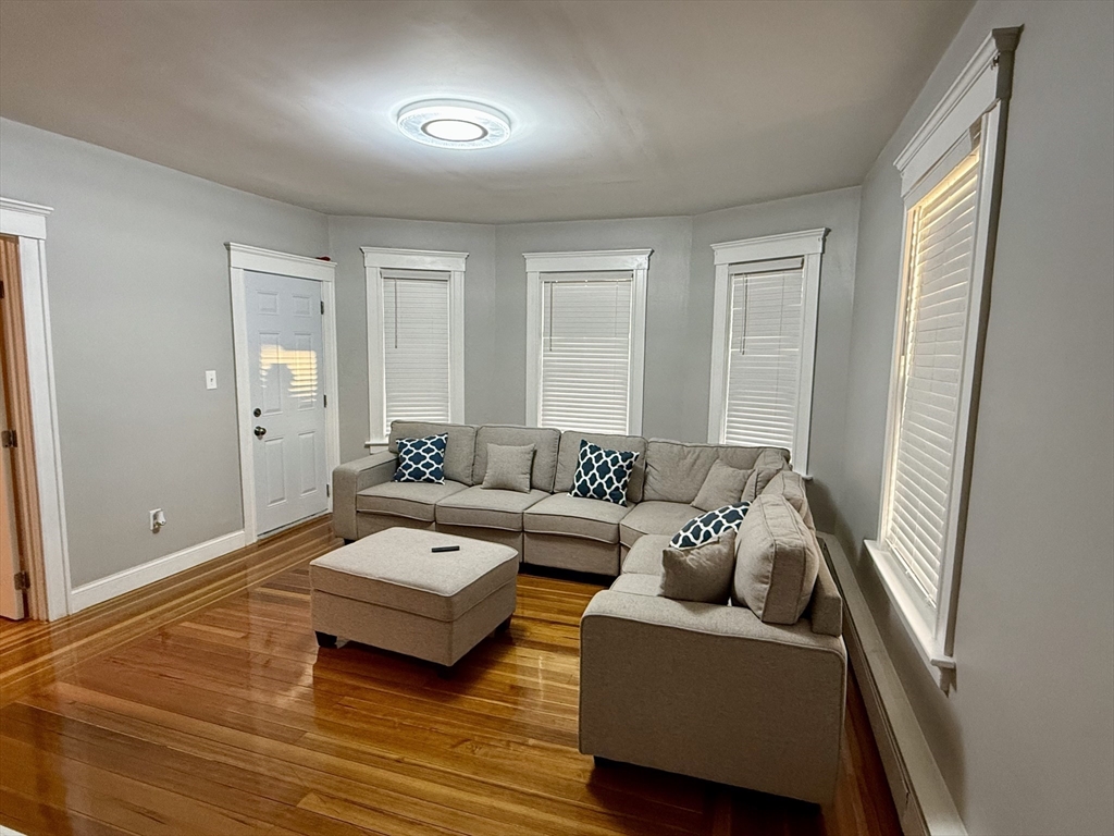 142 Cote Avenue Woonsocket, RI 02895 - Photo 13 of 22 a living room with furniture and a window
