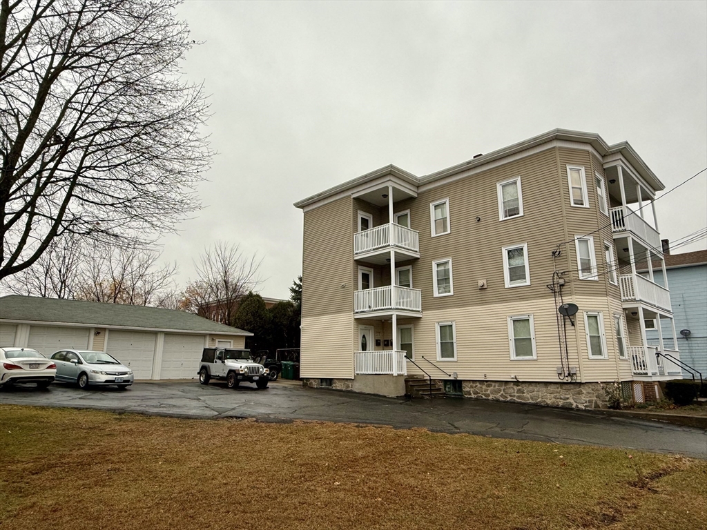 142 Cote Avenue Woonsocket, RI 02895 - Photo 2 of 22 a front view of a house with a ocean view